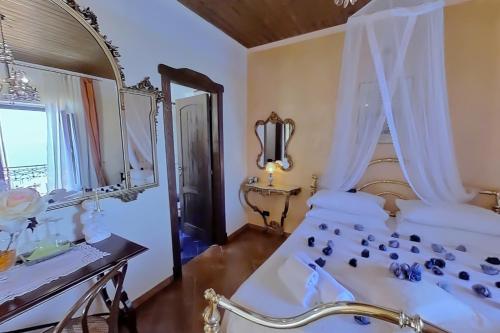 Ένα ή περισσότερα κρεβάτια σε δωμάτιο στο Casa Angelieri