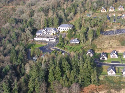 an aerial view of a house on a mountain at Aherlow House Hotel & Lodges in Aherlow