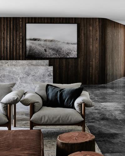 a living room with a couch and a table at The Mitchelton Hotel Nagambie in Nagambie
