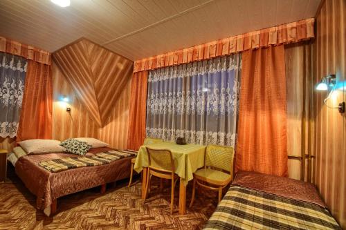 Postel nebo postele na pokoji v ubytování U Małgorzaty