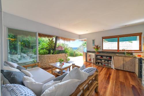 a living room with a couch and a table at Diniview Villa Resort in Boracay