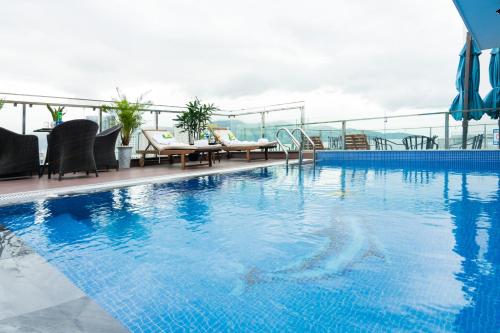 a large swimming pool on top of a building at Dana Marina Boutique Hotel in Da Nang