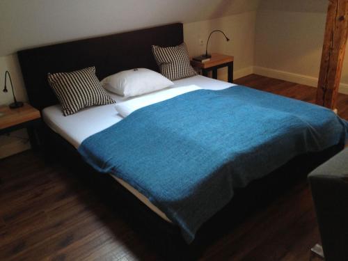 Säng eller sängar i ett rum på Villa Adam