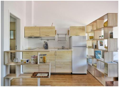 Η κουζίνα ή μικρή κουζίνα στο Flats 323 apartments