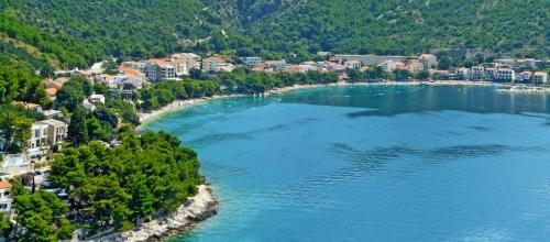 an aerial view of a town on the shore of a lake at Apartmani Kežić Drvenik in Drvenik