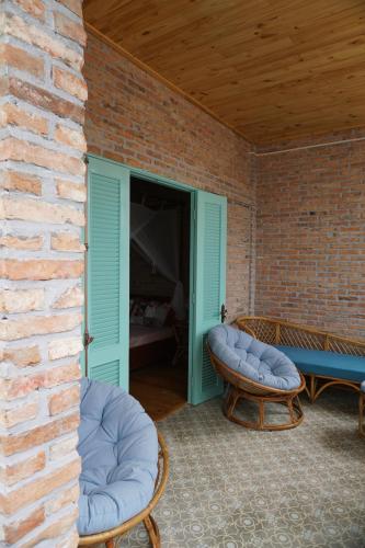 Χώρος καθιστικού στο Nam Thi Holiday Home
