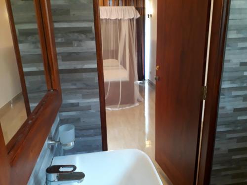 Koupelna v ubytování Nooit Gedacht Holiday Resort Unawatuna