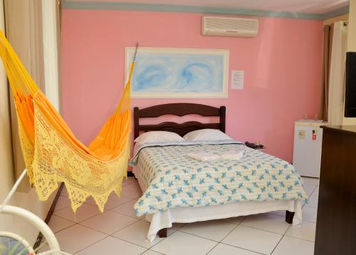 Cama o camas de una habitación en Hotel Ibiapaba