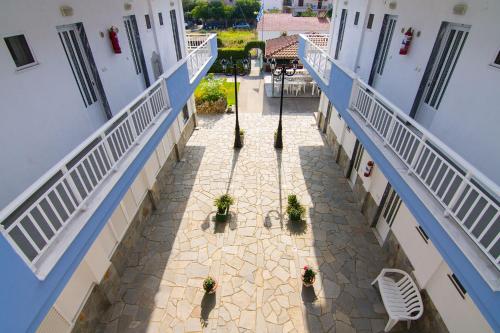 an overhead view of a courtyard in a building at Armiriki Rooms in Vrasná