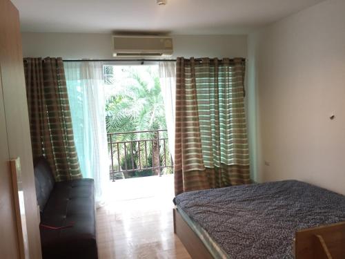 Postel nebo postele na pokoji v ubytování AD Resort Huahin Chaam