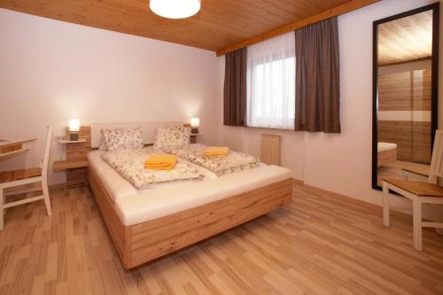Postel nebo postele na pokoji v ubytování Apartments Obernosterer - Großglockner