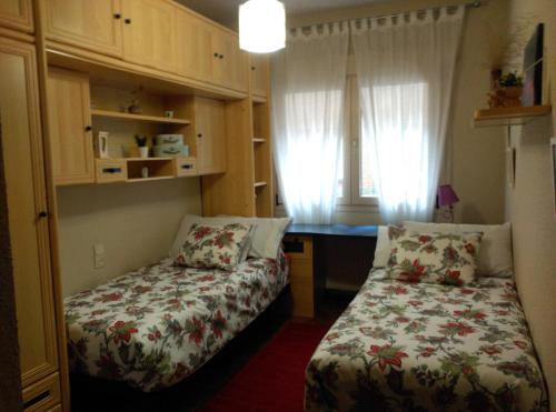 Postelja oz. postelje v sobi nastanitve Apartamento Homelife Buenavista 2