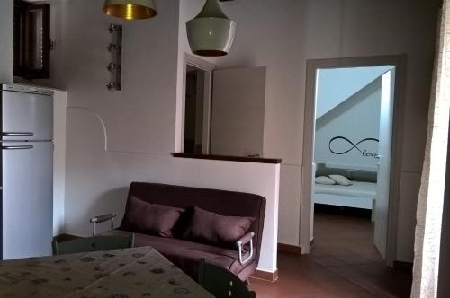 Tempat tidur dalam kamar di A 100 passi da Calarossa