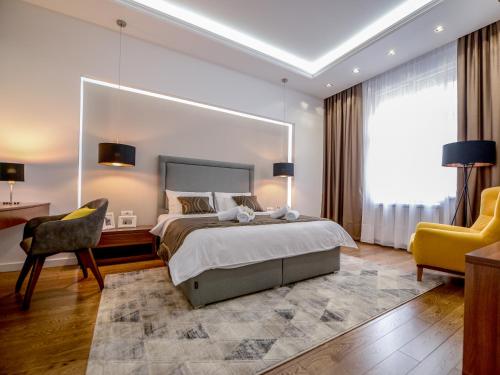 Krevet ili kreveti u jedinici u okviru objekta Main Square Residence