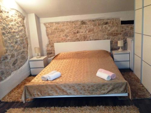 Llit o llits en una habitació de Rooms Grof