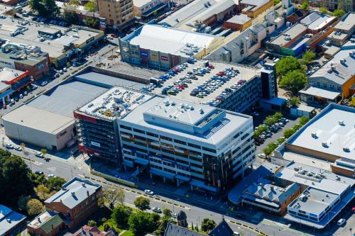 an overhead view of a building in a city at Mantra Albury in Albury