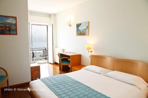 Postel nebo postele na pokoji v ubytování Garden Rooms 1