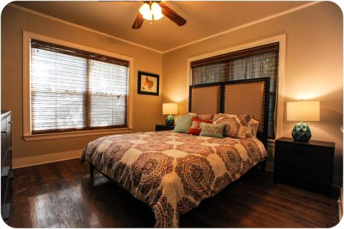 a bedroom with a bed and a window at The Coyle Cabin - Close to Downtown, Stadiums, U of H, Med Center in Houston