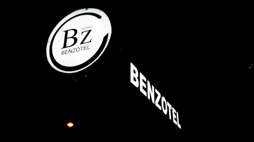 a sign that says bz boulevard and a street sign at KhaoLak Benzotel in Khao Lak