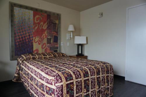 Postelja oz. postelje v sobi nastanitve Econo Lodge San Antonio Northeast I-35