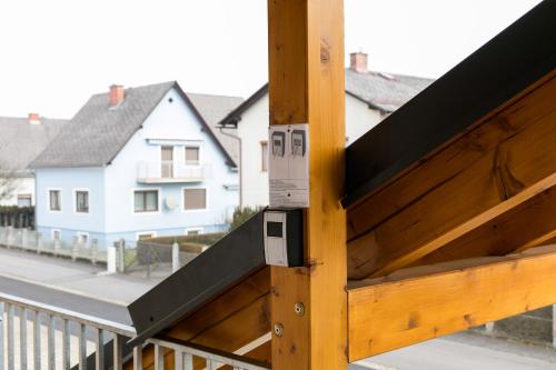 a close up of a wooden door on a balcony at Design-Apartments Graz in Graz