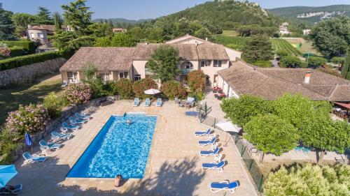 an aerial view of a pool at a resort at Le Clos des Bruyères in Vallon-Pont-dʼArc