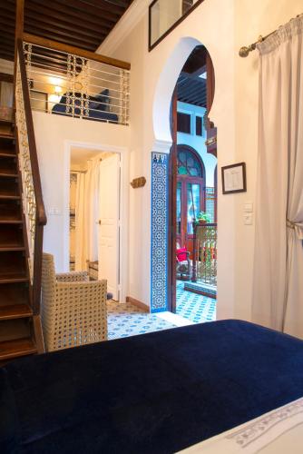 a room with a staircase leading to a patio at El Reducto in Tetouan