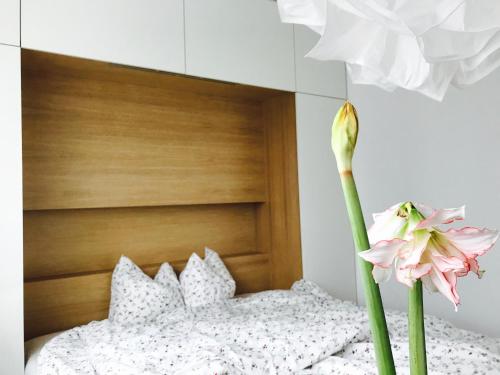 Ένα ή περισσότερα κρεβάτια σε δωμάτιο στο Design Apartment in Park