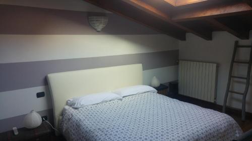 Cama ou camas em um quarto em Borghello 2Level Airport