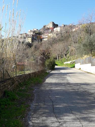 an empty road with a city in the background at Da Giusè in Trebiano