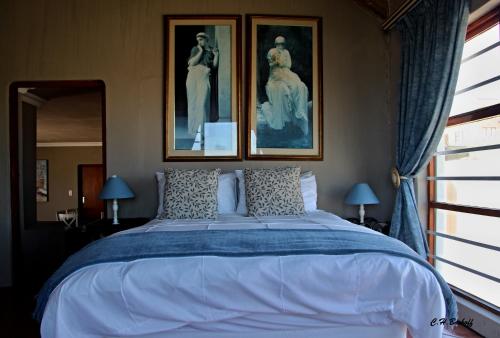 Кровать или кровати в номере Walkerbay Accommodation