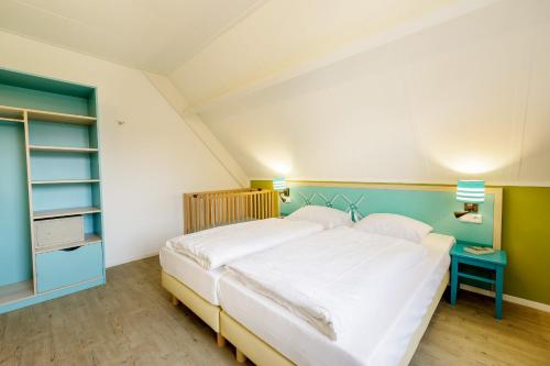 Postel nebo postele na pokoji v ubytování Center Parcs Nordseeküste Bremerhaven