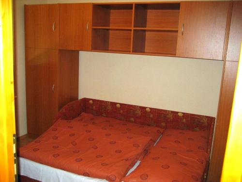 Postel nebo postele na pokoji v ubytování Lala Apartmanok