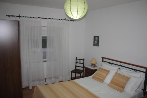 Posteľ alebo postele v izbe v ubytovaní Quinta Teresinha
