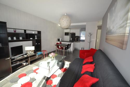 Кът за сядане в Appartement St Malo Rotheneuf