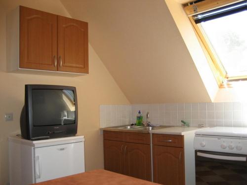 Kuchyň nebo kuchyňský kout v ubytování Lala Apartmanok