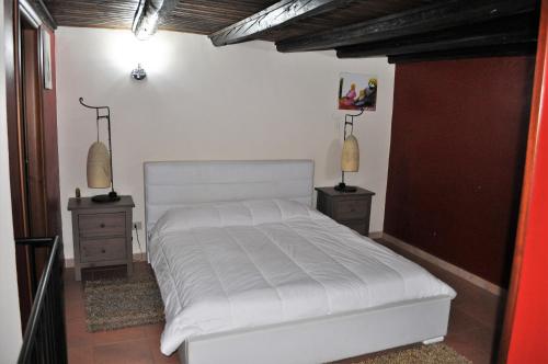 Postel nebo postele na pokoji v ubytování Kalza House
