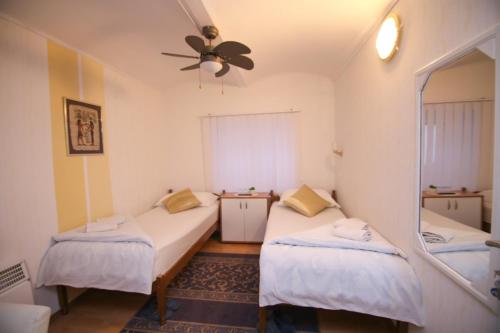 Cama o camas de una habitación en Guesthouse Kod Keme