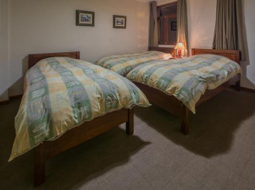 Postel nebo postele na pokoji v ubytování Hotel Santa Cruz