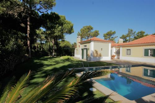 an image of a house with a swimming pool at Luxury Private Villa with Pool - Cascais in Cascais