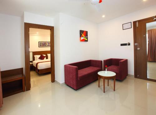 Postel nebo postele na pokoji v ubytování Hotel Park Residency Kozhencherry