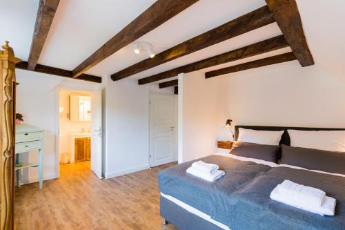 מיטה או מיטות בחדר ב-Zur Burgstiege
