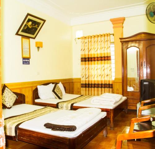 Katil atau katil-katil dalam bilik di Phương Phương 1 Hotel