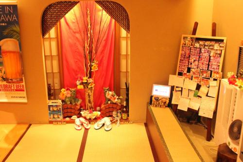 Photo de la galerie de l'établissement Okinawa Minshuku Kariyushi, à Shirahama