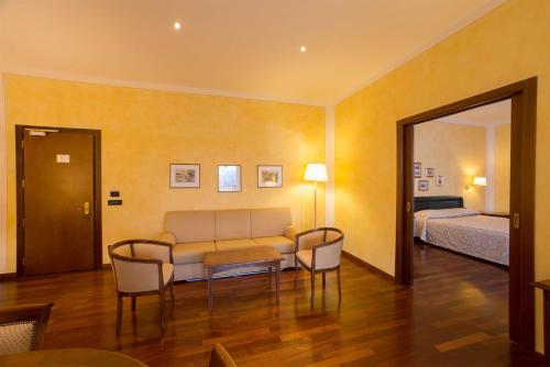 Ένα ή περισσότερα κρεβάτια σε δωμάτιο στο Hotel Conteverde