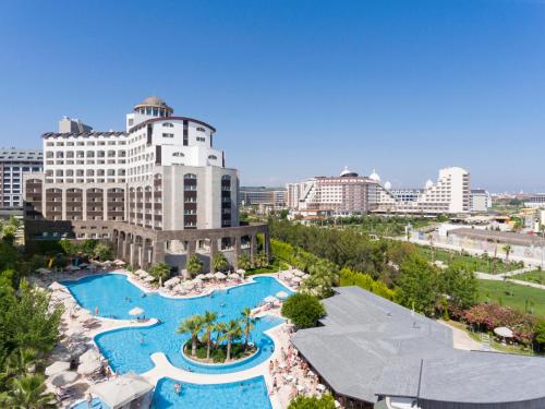 an aerial view of a resort with two swimming pools at Melas Lara Hotel in Lara