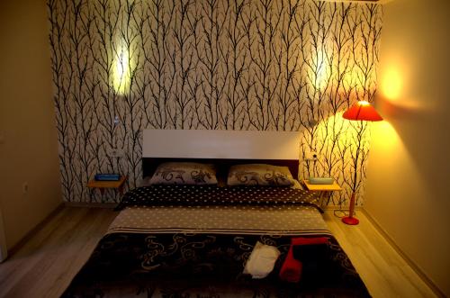 Una cama o camas en una habitación de Konukevim Apartments