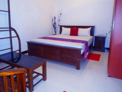 Cama o camas de una habitación en Palmary Beach Villa
