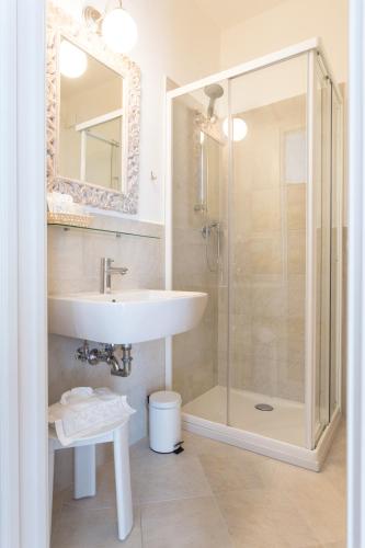 a bathroom with a sink and a shower at B&B La Bragadina in Venice-Lido