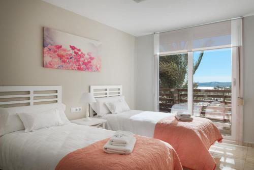 Posteľ alebo postele v izbe v ubytovaní Apartamentos Marta PLAYA